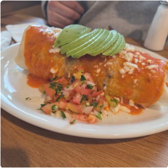 Super Burrito with red salsa and queso fresco